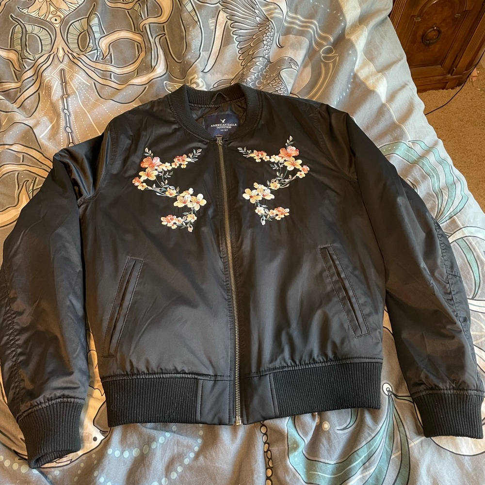 Navy blue bomber jacket with cherry blossoms